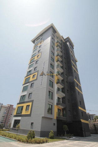 Апартаменты планировки 1+1, 65м2 в новом жилом комплексе в районе Махмутлар - Ракурс 24