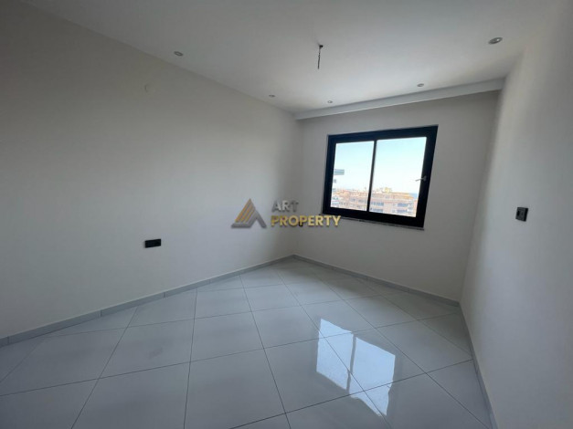 Апартаменты планировки 1+1 в комплексе уровня отеля 5*, район Махмутлар - Ракурс 3