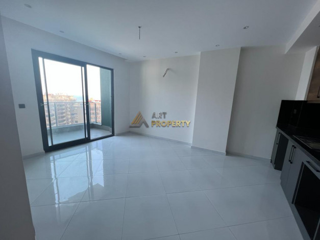 Апартаменты планировки 1+1 в комплексе уровня отеля 5*, район Махмутлар - Ракурс 4