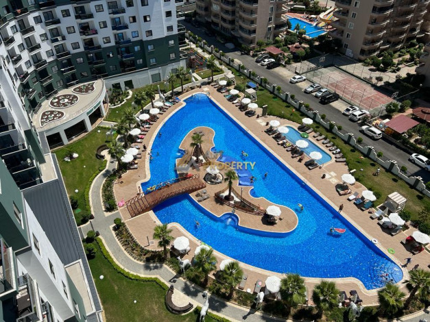 Апартаменты планировки 1+1 в комплексе уровня отеля 5*, район Махмутлар - Ракурс 8