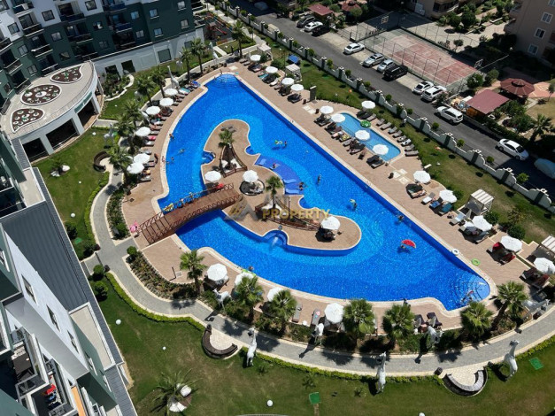 Апартаменты планировки 1+1 в комплексе уровня отеля 5*, район Махмутлар - Ракурс 9