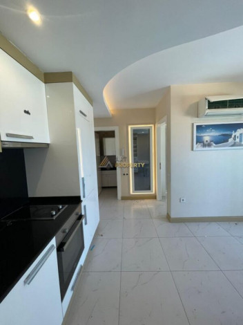 Меблированные апартаменты планировки 1+1, 60м2 в центре города Аланья - Ракурс 13