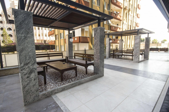 Апартаменты 1+1, 2+1, 3+1 в жилом комплексе на 1 береговой линии, район Махмутлар - Ракурс 5