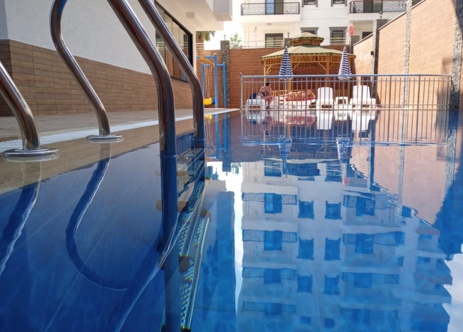 Двухкомнатная квартира в новом доме в районе Махмутлар, 55 м2 - Ракурс 31