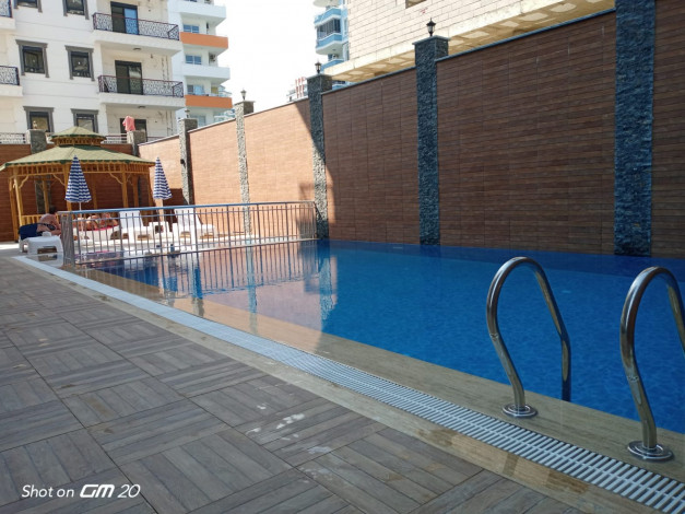 Двухкомнатная квартира в новом доме в районе Махмутлар, 55 м2 - Ракурс 32