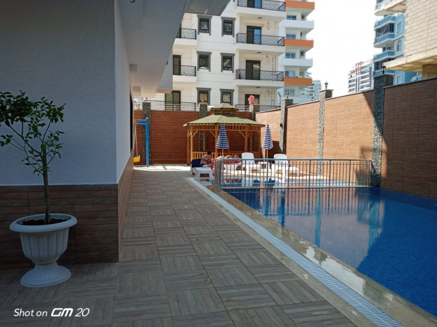 Двухкомнатная квартира в новом доме в районе Махмутлар, 55 м2 - Ракурс 33