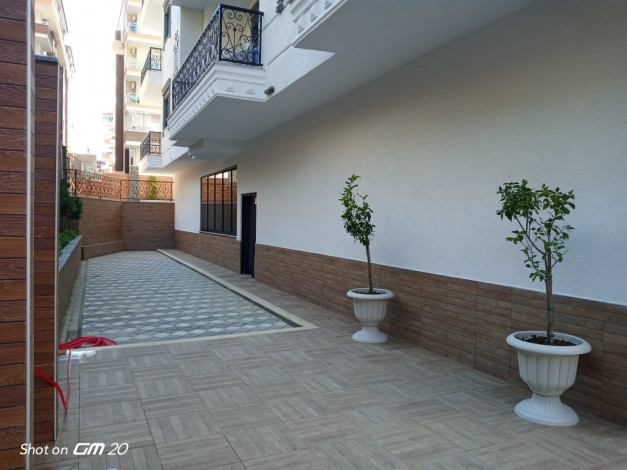 Двухкомнатная квартира в новом доме в районе Махмутлар, 55 м2 - Ракурс 37