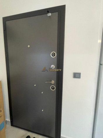 Уютная меблированная квартира планировки 1+1, 55м2 рядом с древним городом Наула, Махмутлар - Ракурс 2