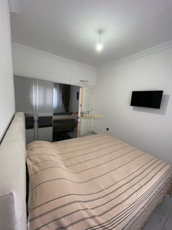 Уютная меблированная квартира планировки 1+1, 55м2 рядом с древним городом Наула, Махмутлар - Ракурс 3