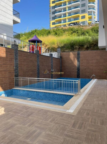 Уютная меблированная квартира планировки 1+1, 55м2 рядом с древним городом Наула, Махмутлар - Ракурс 10