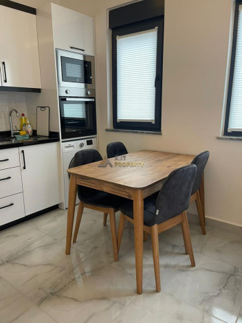 Уютная меблированная квартира планировки 1+1, 55м2 рядом с древним городом Наула, Махмутлар - Ракурс 13