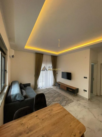 Уютная меблированная квартира планировки 1+1, 55м2 рядом с древним городом Наула, Махмутлар - Ракурс 15