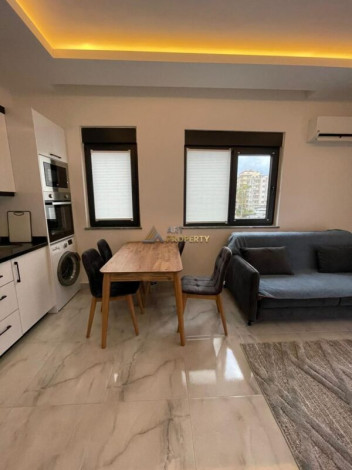 Уютная меблированная квартира планировки 1+1, 55м2 рядом с древним городом Наула, Махмутлар - Ракурс 16