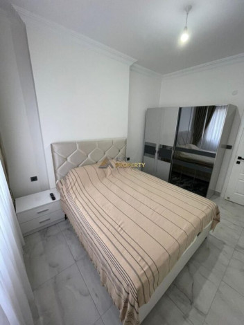 Уютная меблированная квартира планировки 1+1, 55м2 рядом с древним городом Наула, Махмутлар - Ракурс 26