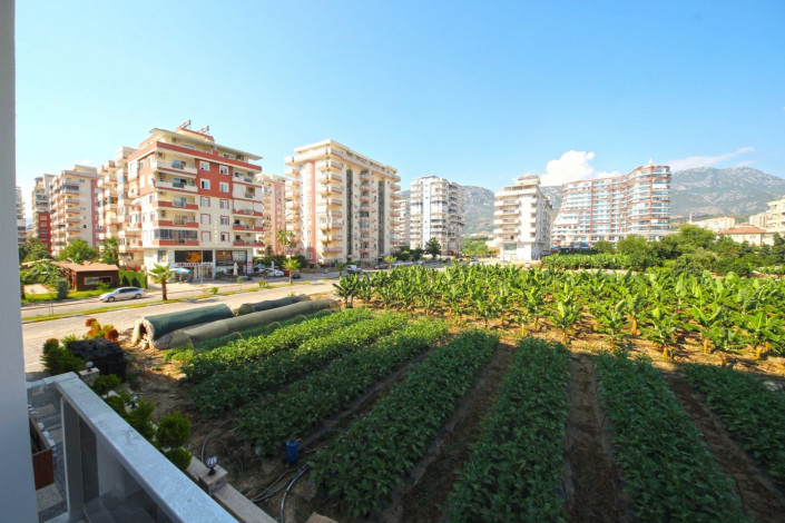 В центре района Махмутлар двухкомнатная квартира с современным ремонтом, 65 м2 - Ракурс 6