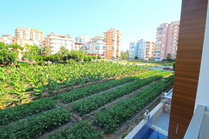 В центре района Махмутлар двухкомнатная квартира с современным ремонтом, 65 м2 - Ракурс 10