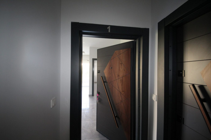 В центре района Махмутлар двухкомнатная квартира с современным ремонтом, 65 м2 - Ракурс 20