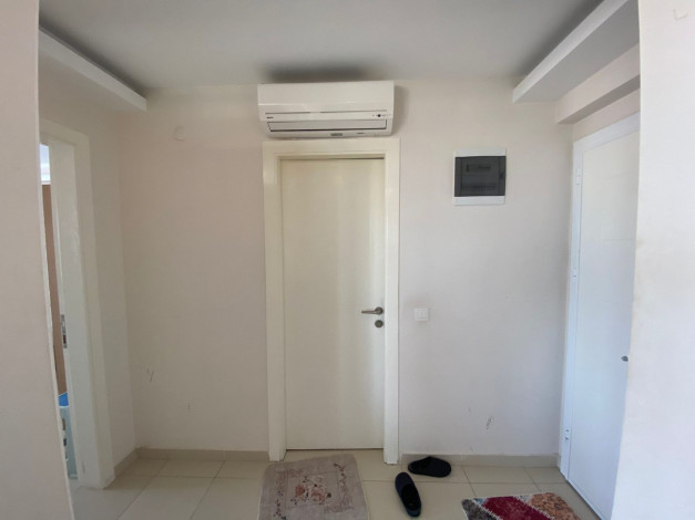 Меблированные апартаменты 1+1 с видом на море в районе Тосмур, 65 м2 - Ракурс 9