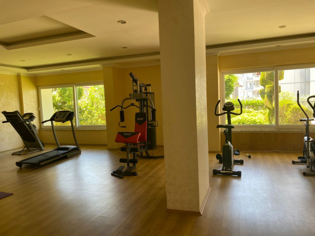 Меблированные апартаменты 1+1 с видом на море в районе Тосмур, 65 м2 - Ракурс 14