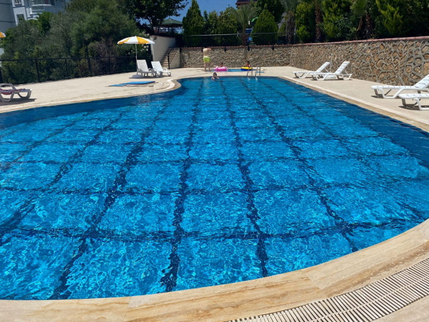 Меблированные апартаменты 1+1 с видом на море в районе Тосмур, 65 м2 - Ракурс 16