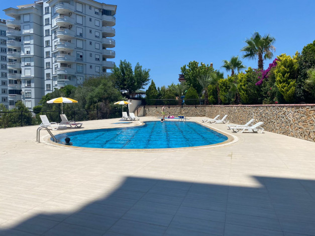 Меблированные апартаменты 1+1 с видом на море в районе Тосмур, 65 м2 - Ракурс 18