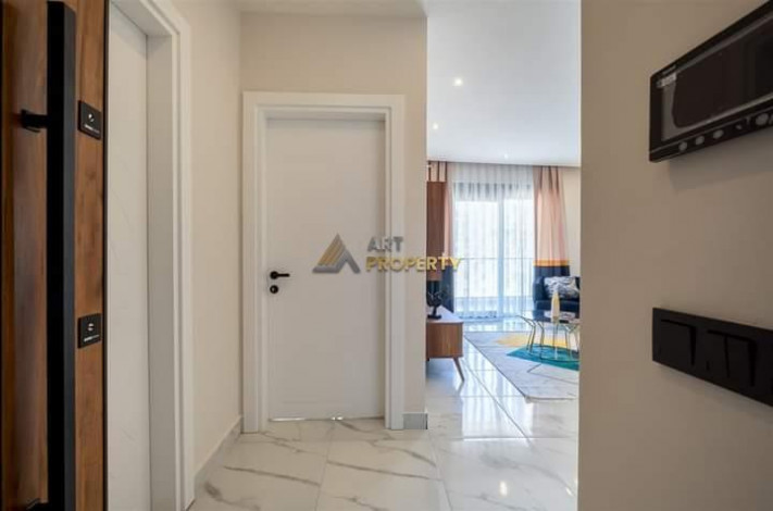 Меблированная квартира планировки 1+1, 65м2 в престижном районе Оба - Ракурс 2