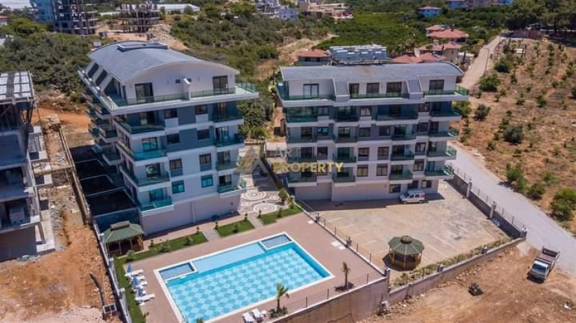 Меблированная квартира планировки 1+1, 65м2 в престижном районе Оба - Ракурс 8