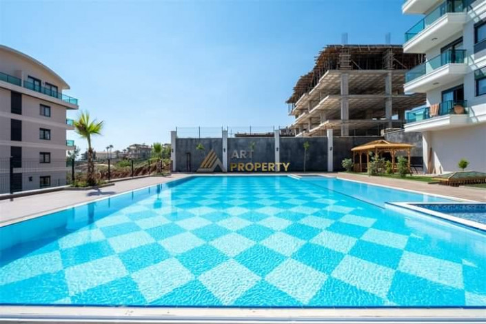 Меблированная квартира планировки 1+1, 65м2 в престижном районе Оба - Ракурс 10