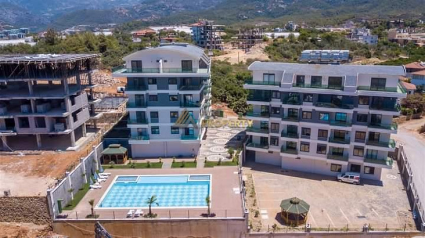 Меблированная квартира планировки 1+1, 65м2 в престижном районе Оба - Ракурс 14