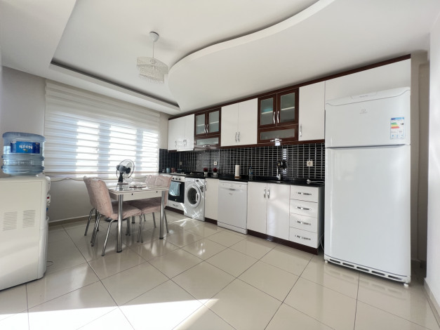 Меблированная квартира планировки 1+1, 65м2 с видом на море, район Махмутлар - Ракурс 4