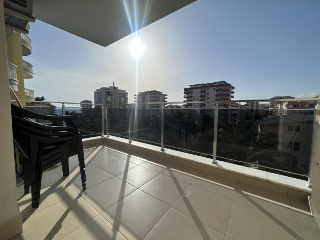 Меблированная квартира планировки 1+1, 65м2 с видом на море, район Махмутлар - Ракурс 13