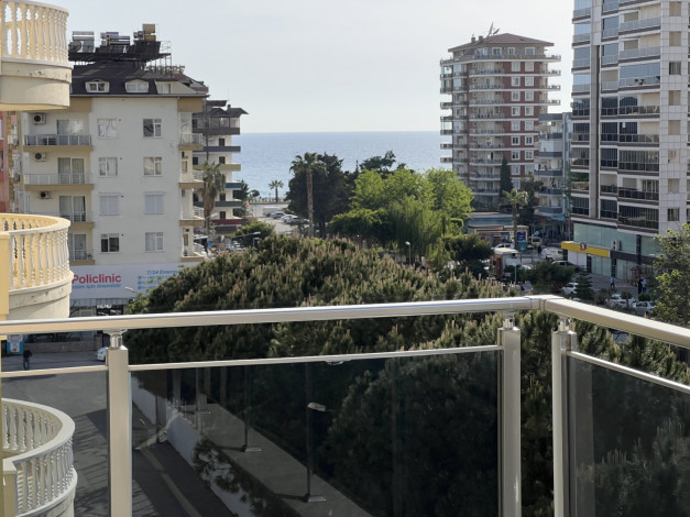 Меблированная квартира планировки 1+1, 65м2 с видом на море, район Махмутлар - Ракурс 14