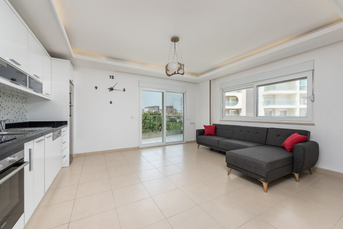 Просторная меблированная квартира планировки 1+1, 77м2 в районе Авсаллар - Ракурс 12