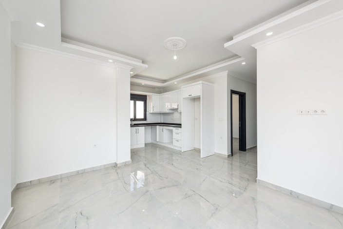 Апартаментами 1+1 и 2+1 в готовом проекте от застройщика, район Авсаллар - Ракурс 4