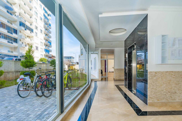 Меблированная квартира планировки 1+1, 60м2 с видом на море, район Махмутлар - Ракурс 14