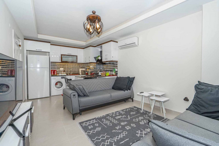 Меблированная квартира планировки 1+1, 60м2 с видом на море, район Махмутлар - Ракурс 22