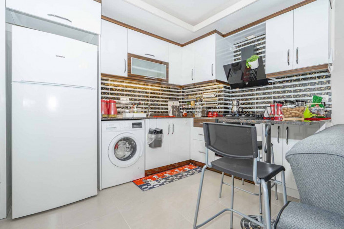 Меблированная квартира планировки 1+1, 60м2 с видом на море, район Махмутлар - Ракурс 23