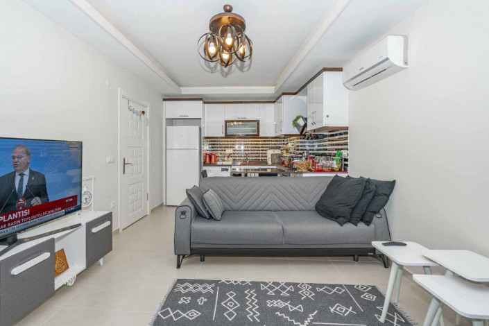 Меблированная квартира планировки 1+1, 60м2 с видом на море, район Махмутлар - Ракурс 25