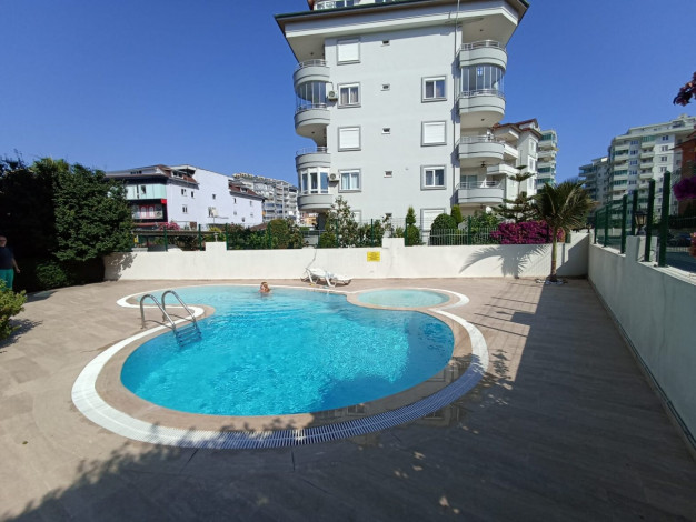 Меблированная квартира планировки 1+1, 55м2 в раойне Оба - Ракурс 10