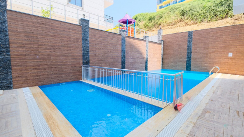 Меблированная квартира планировки 1+1, 60м2 в новом жилом комплексе, район Махмутлар - Ракурс 11