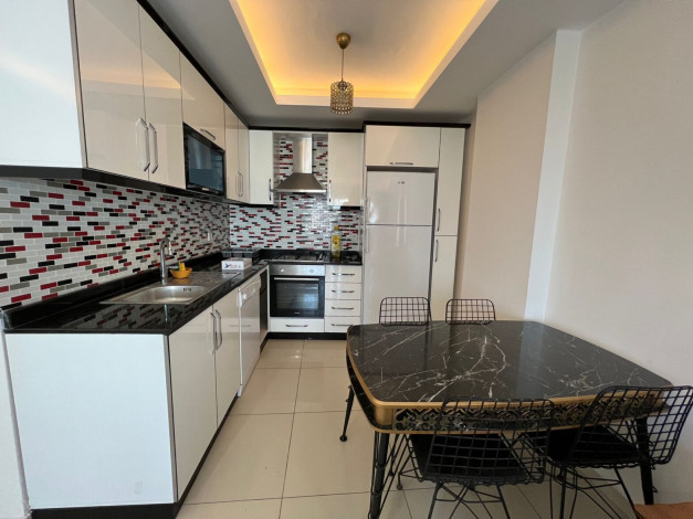 Большая меблированная квартира планировки 1+1, 80м2 с видом на море, Махмутлар - Ракурс 9