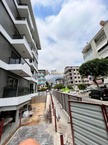 Апартаменты 1+1, 49м2 в новом жилом комплексе в центре города Аланья - Ракурс 1