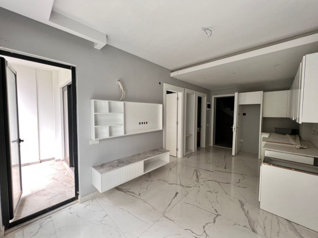 Апартаменты 1+1, 49м2 в новом жилом комплексе в центре города Аланья - Ракурс 7