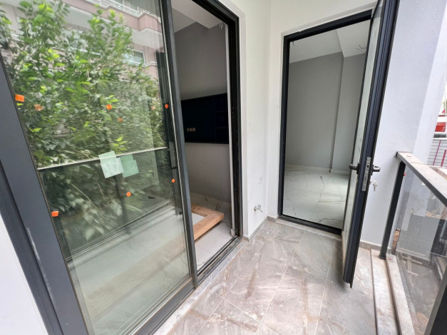 Апартаменты 1+1, 49м2 в новом жилом комплексе в центре города Аланья - Ракурс 17