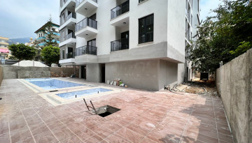 Апартаменты 1+1, 49м2 в новом жилом комплексе в центре города Аланья - Ракурс 19