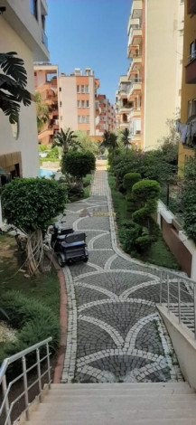 Меблированная квартира планировки 1+1, 65м2 в уютном комплексе района Махмутлар - Ракурс 8