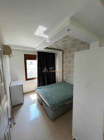 Меблированная квартира планировки 1+1, 65м2 в уютном комплексе района Махмутлар - Ракурс 10