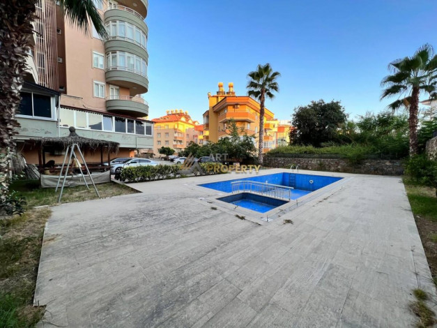 Квартира планировки 3+1, 185м2 с отдельной кухней с видом на море и крепость, центр Алании - Ракурс 4