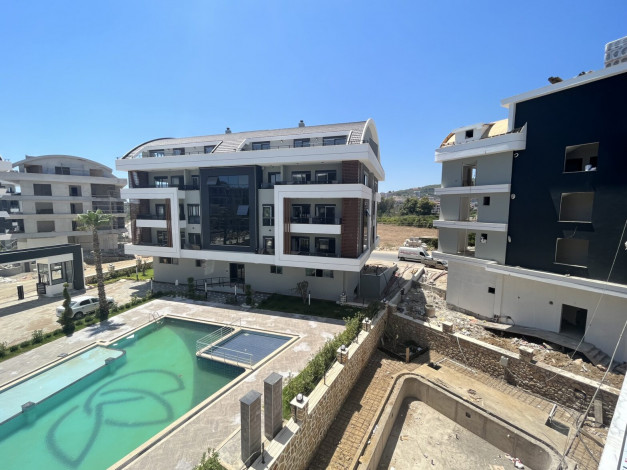 Апартаменты планировки 1+1, 40м2 в жилом комплексе на стадии строительства, район Оба - Ракурс 17