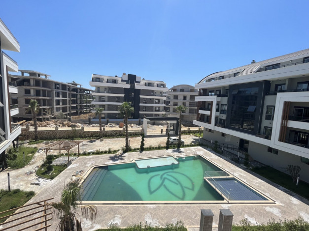 Апартаменты планировки 1+1, 40м2 в жилом комплексе на стадии строительства, район Оба - Ракурс 18